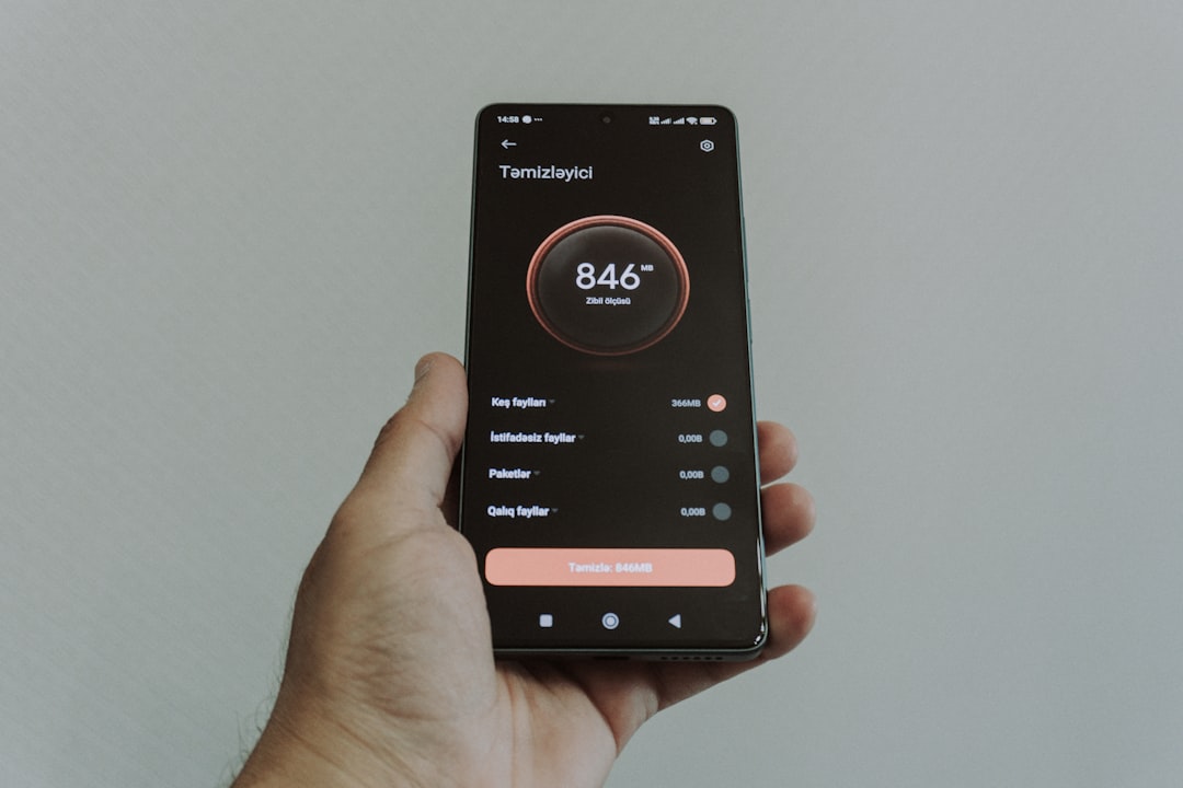 ITパスポート対策アプリを個人開発！一問一答・模試・ダッシュボードを1日で実装した記録 - Hand holding smartphone displaying a health application